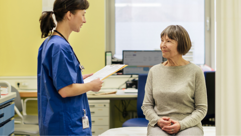 Clinician conversing with a clinical trial participant at a study site