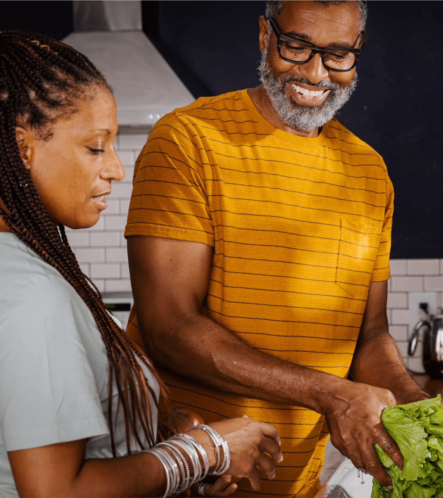 Two people in their kitchen