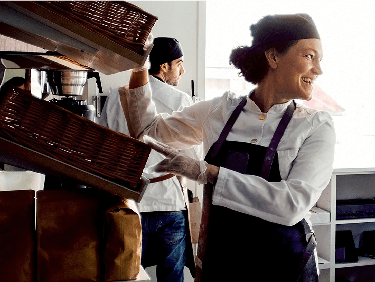 A woman in her forties smiling while at work. She’s happier because she’s fitting easier diabetes management in his busy life with a virtual program.