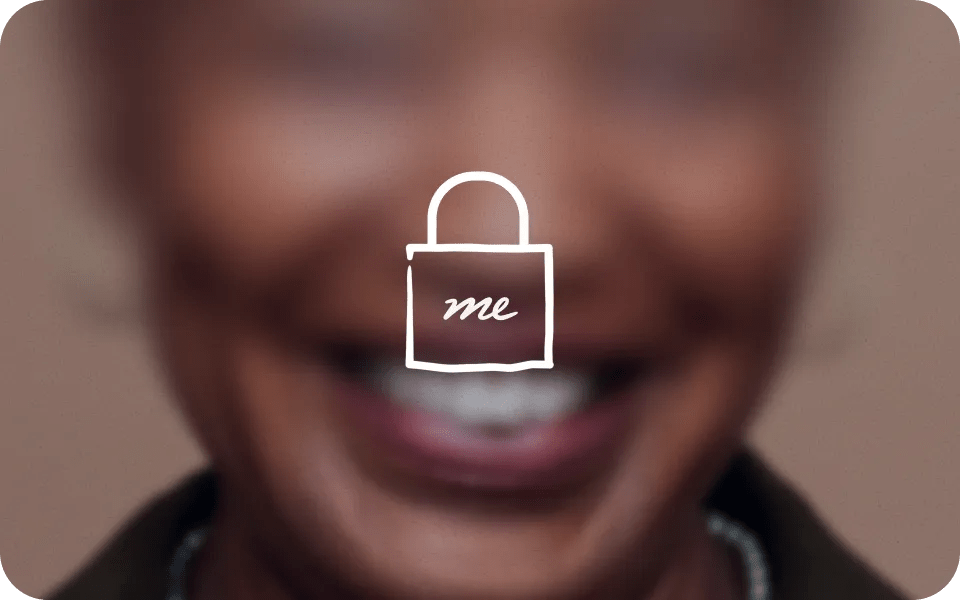 The Verily Me app icon in a padlock appears in front of a blurred headshot of a woman.