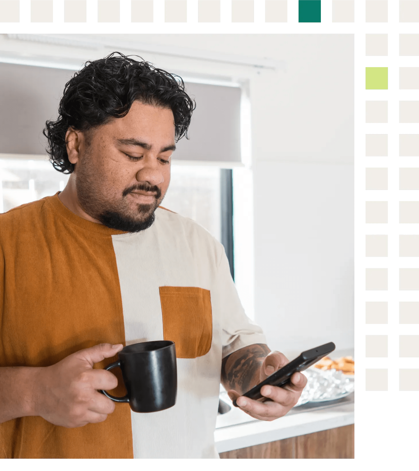 A Samoan man in his forties with prediabetes and hypertension looking at his virtual chronic care program app for healthy breakfast choices while having coffee in his kitchen.