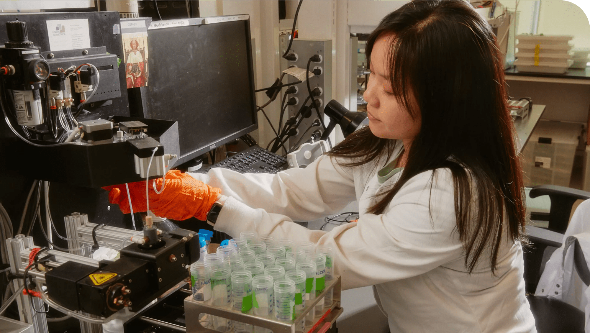 Verily scientist reviewing samples in their labspace