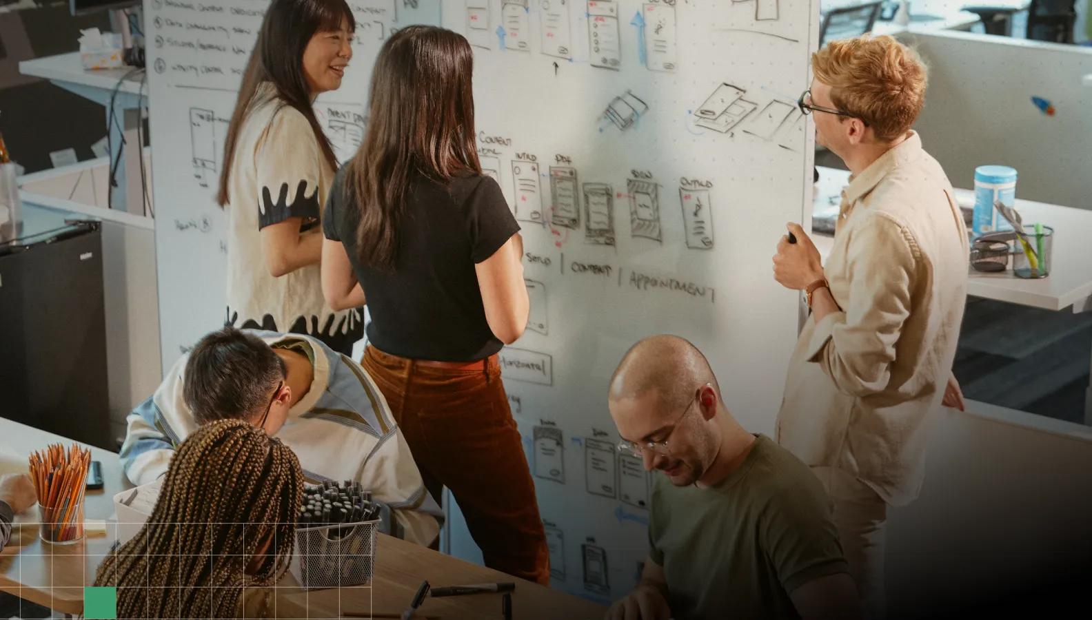 Various Verily team members brainstorming together on a product’s user experience flow.